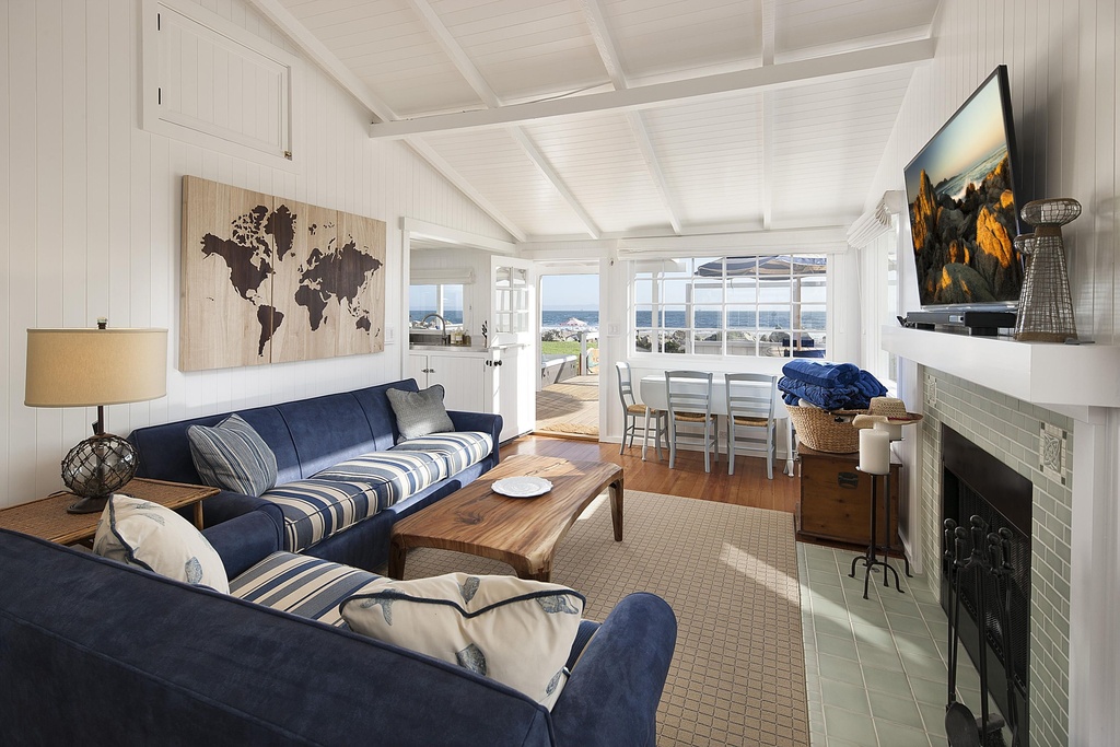 cottage-living-room-with-reclaimed-wood-and-blue-couch-i_g-ISdgxc5txehowr1000000000-arNpP