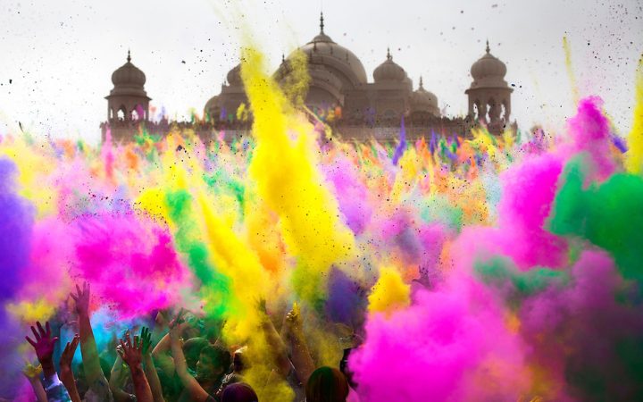 Thousands throw colored powder in sequence every 2 hours during the Holi Festival of Colors, on Saturday, Mar. 24, 2012, at the Lotus Temple, in Spanish Fork, Utah. (Photo by Benjamin B. Morris ©2012)